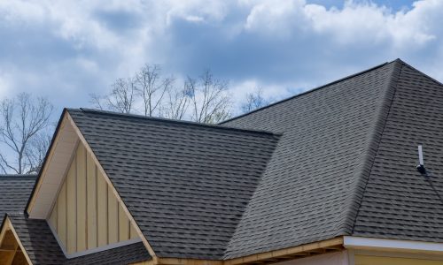 Asphalt,Shingles,Roofing,Construction,Waterproofing,For,New,House,In,Covered